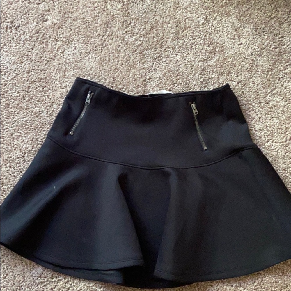 Black mini skirt.